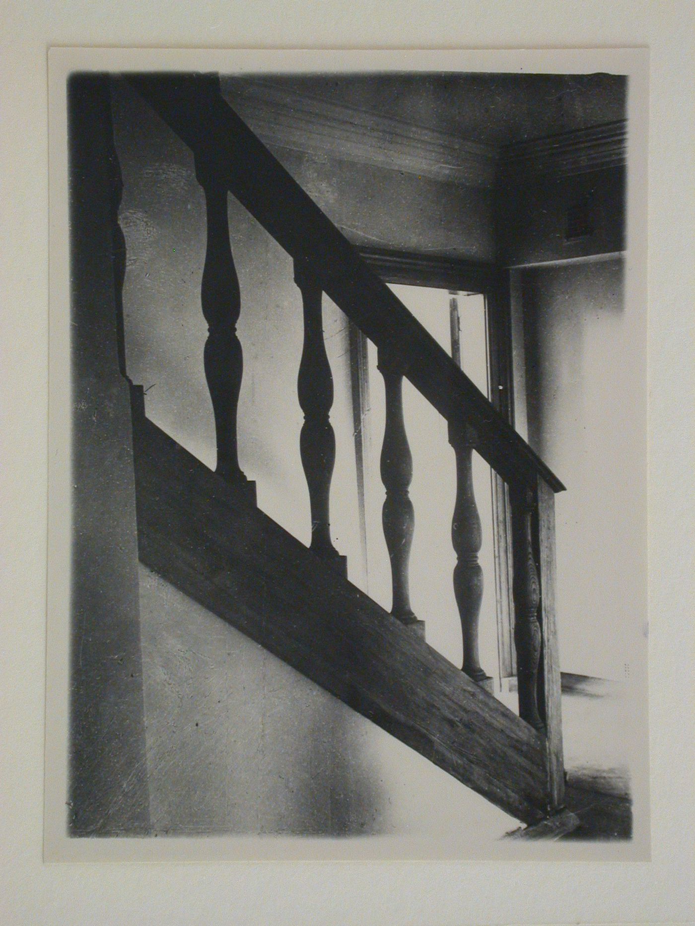 Interior view of an apartment showing a staircase balustrade, 16 Mokhovaia Street, Moscow