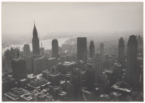 View of Lower Manhattan showing skyscrapers and high-rise buildings with Upper Bay in the foreground, New York City, New York