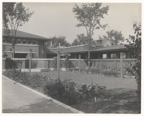View of Darwin D. Martin House showing the house from the garden, and the garage, stable, pergola and clothes poles, Buffalo, New York