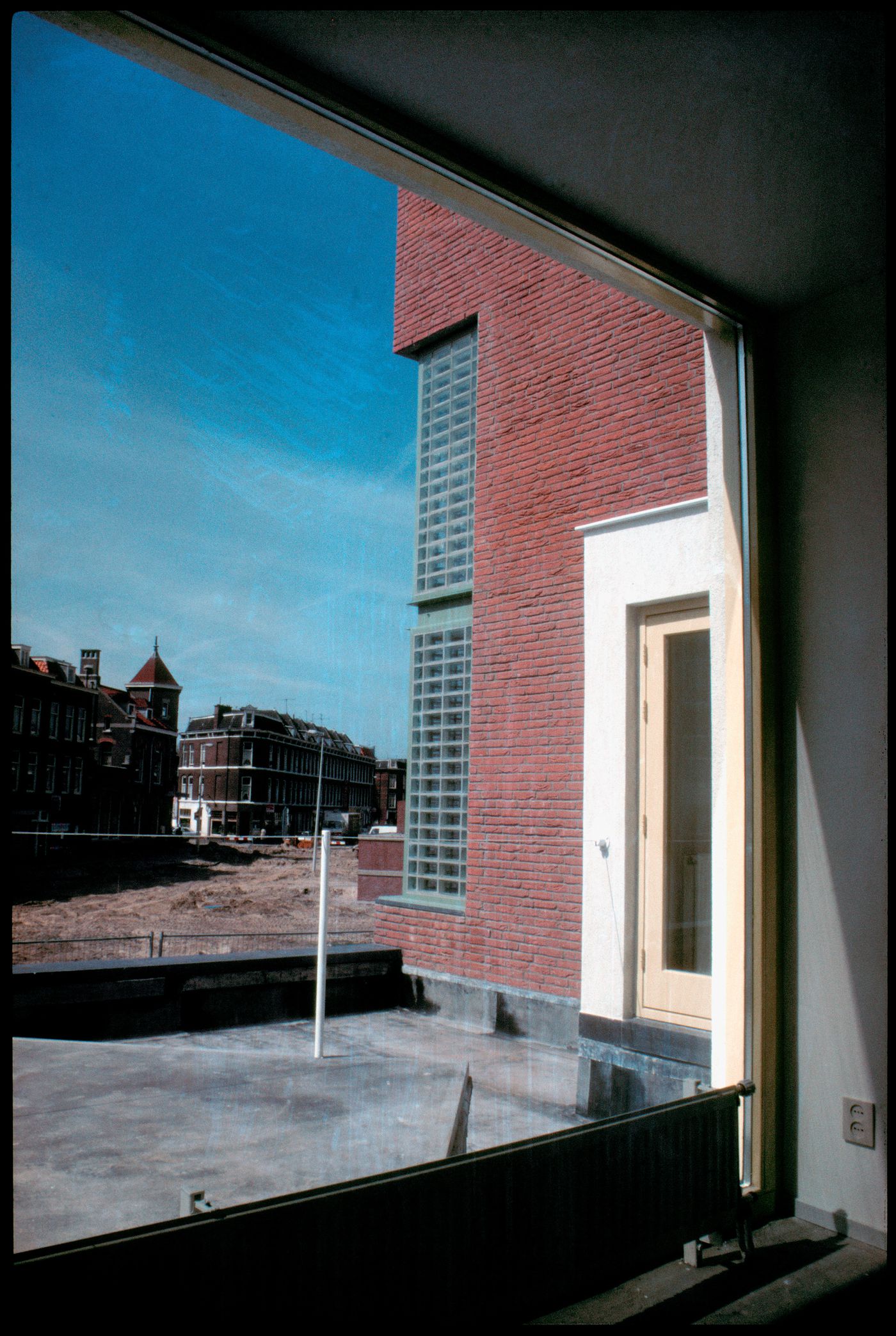 View from interior of Duas habitações e duas lojas [Housing and shopping complex, Schilderswijk], The Hague, The Netherlands
