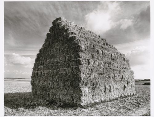 View of bales of straw stacked in the shape of a house, Mainz, Germany