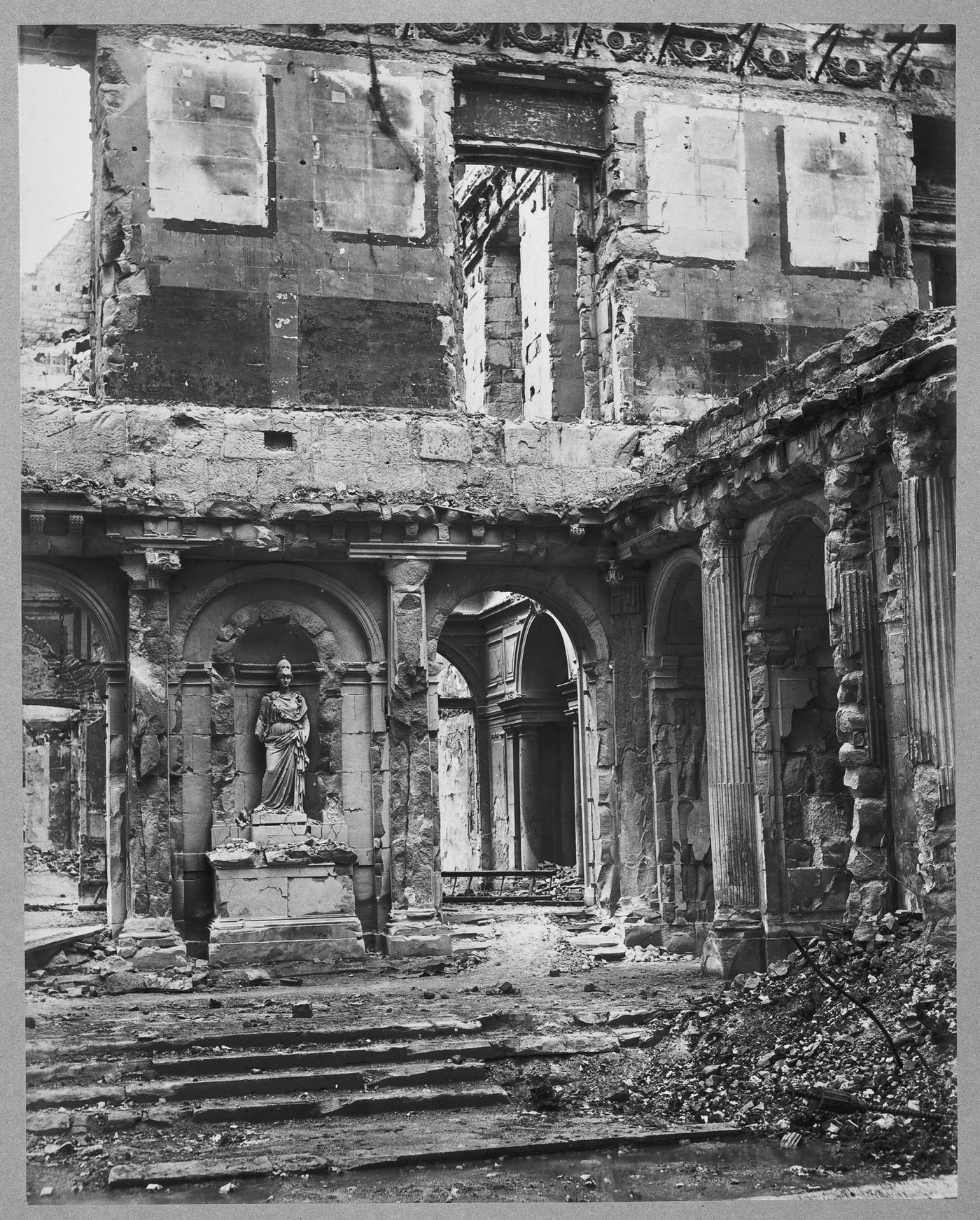 View of the damage to the Tuileries Pavillon de L'Horloge gantry after the Paris Commune, Paris, France