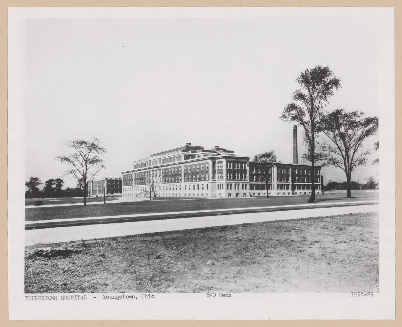 View of the principal and lateral façades of the Youngtown Hospital from across the street [?], Youngtown, Ohio