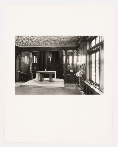 Interior view of the library (now demolished) in the east part of Shaughnessy House showing an altar and a crucifix, Montréal, Québec, Canada