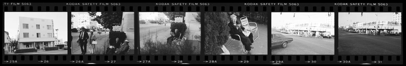 Strip of negatives of people, stores and retirement hotel, Miami, Florida