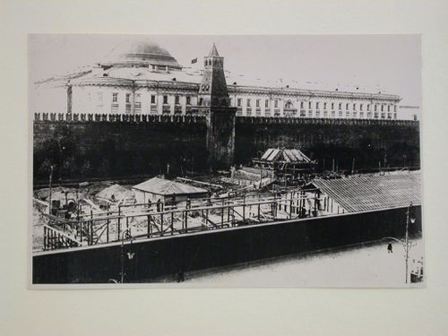 View of the construction site of the stone Lenin Mausoleum from an elevated viewpoint with the Senate Tower and Senate Building in the background, Red Square, Moscow