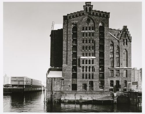 View of a Speicherblock [Storage Block] of Speicherstadt [Storage City] warehouses from across a canal, Megdeburger Strasse, Altstadt, Hamburg, Germany