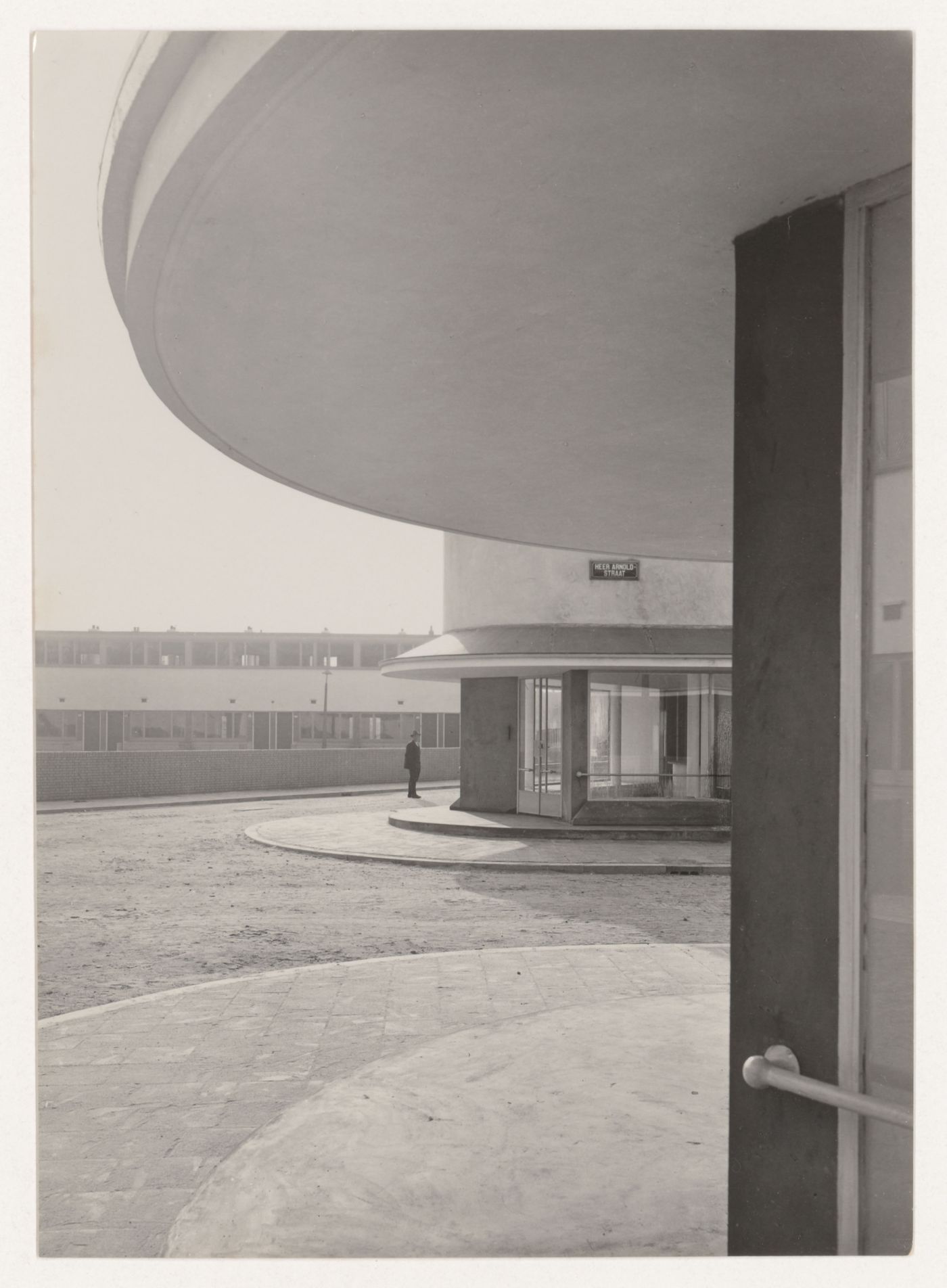 View of the principal façade of Kiefhoek Housing Estate showing a corner store, Rotterdam, Netherlands