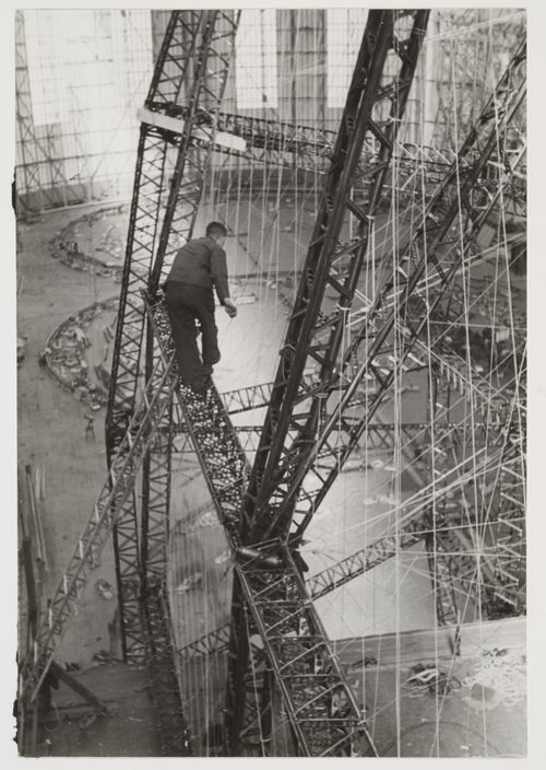 Interior view of the Luftschiffbau Zeppelin factory showing a zeppelin under construction