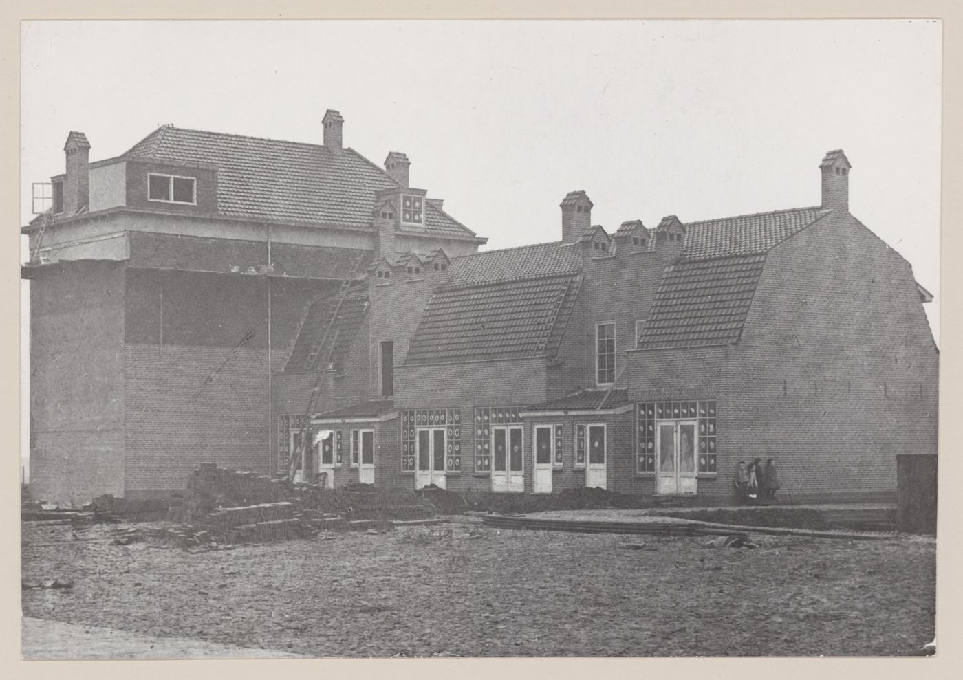 Exterior view of houses and the meeting hall, Vooruit Cooperative, Purmerend, Netherlands