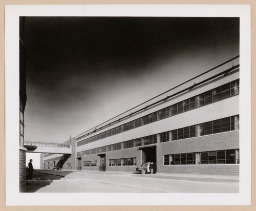 View of the west façade of the Manufacturing Building showing the skywalk to the School, Ford Motor Company Willow Run Bomber Assembly Plant, Willow Run, Michigan