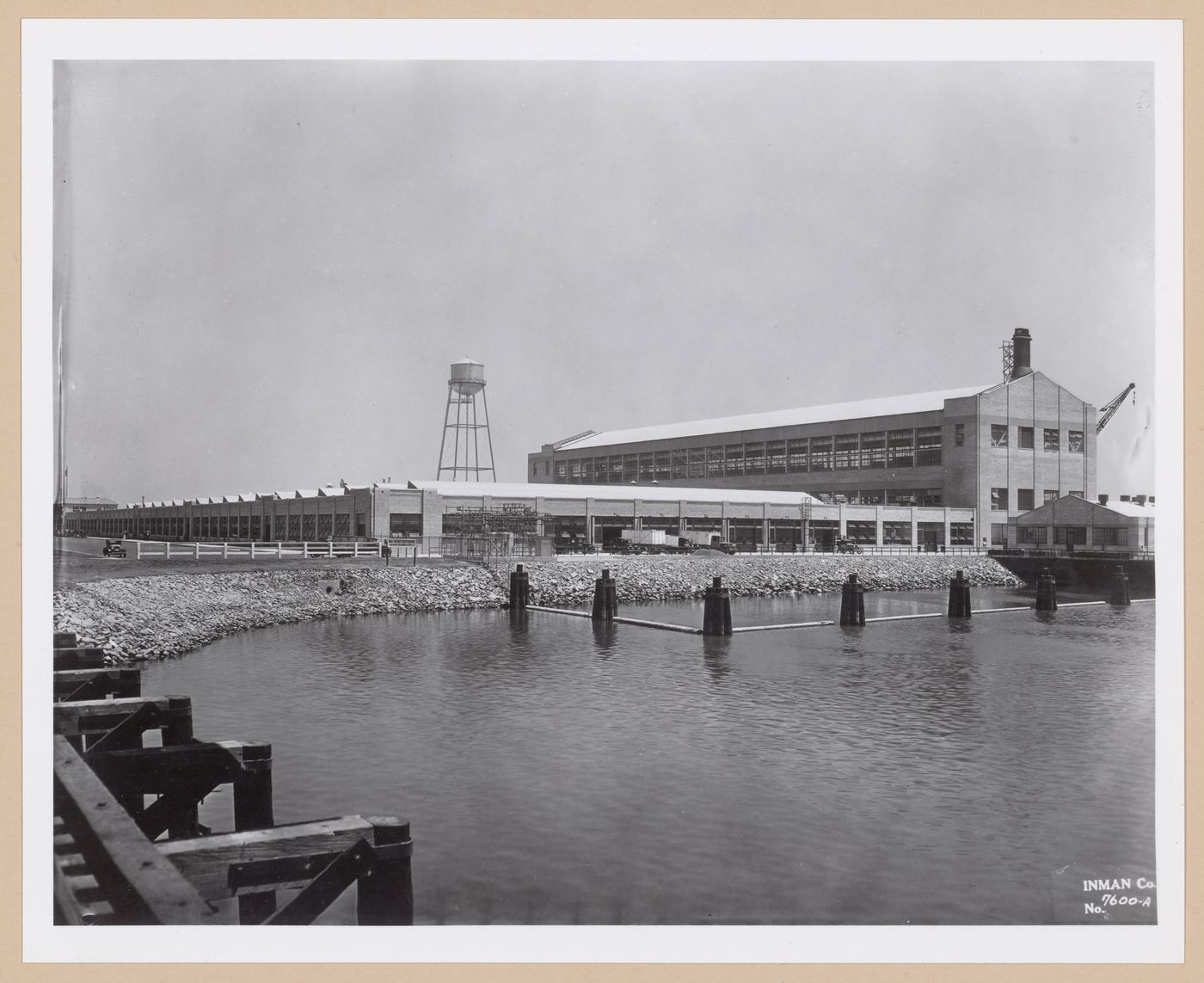 View of the south and east façades of the Assembly Building from the railroad bridge, Ford Motor Company Automobile Assembly Plant, Long Beach, California
