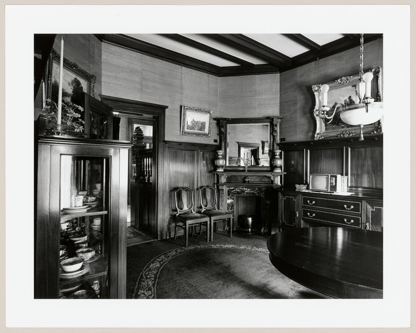 Interior view of the dining room of Slessor House showing the entrance hall through an open door, 1538 avenue Dr. Penfield, Montréal, Québec