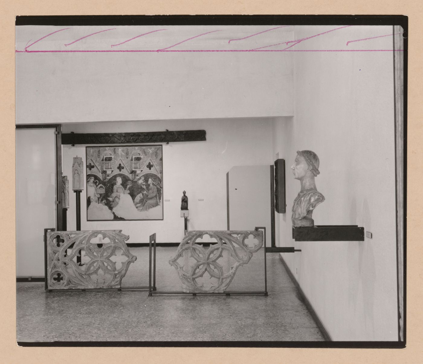Interior view of a gallery showing a bust, painting and fragments of stone tracery, Museo Correr, Venice, Italy