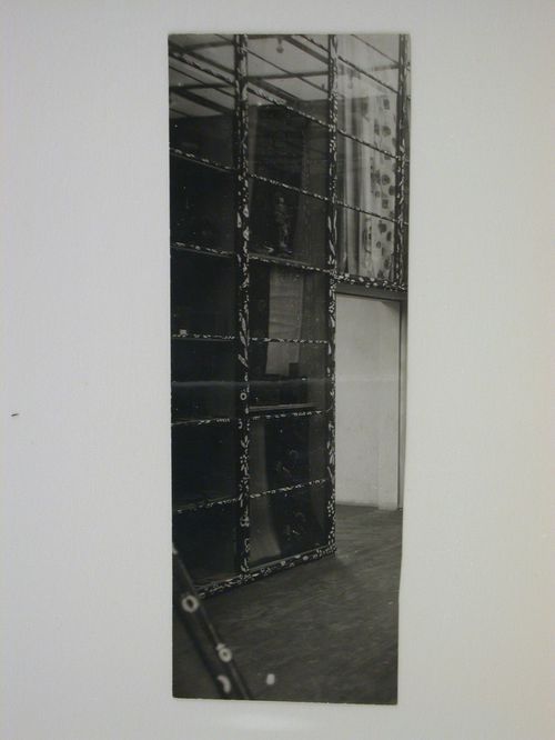 Interior view of a wall of exhibit cases in the Main Exhibition Hall of the Austrian Pavilion, International Exhibition of Modern Decorative and Industrial Arts [Exposition internationale des arts décoratifs et industriels modernes], Paris, France