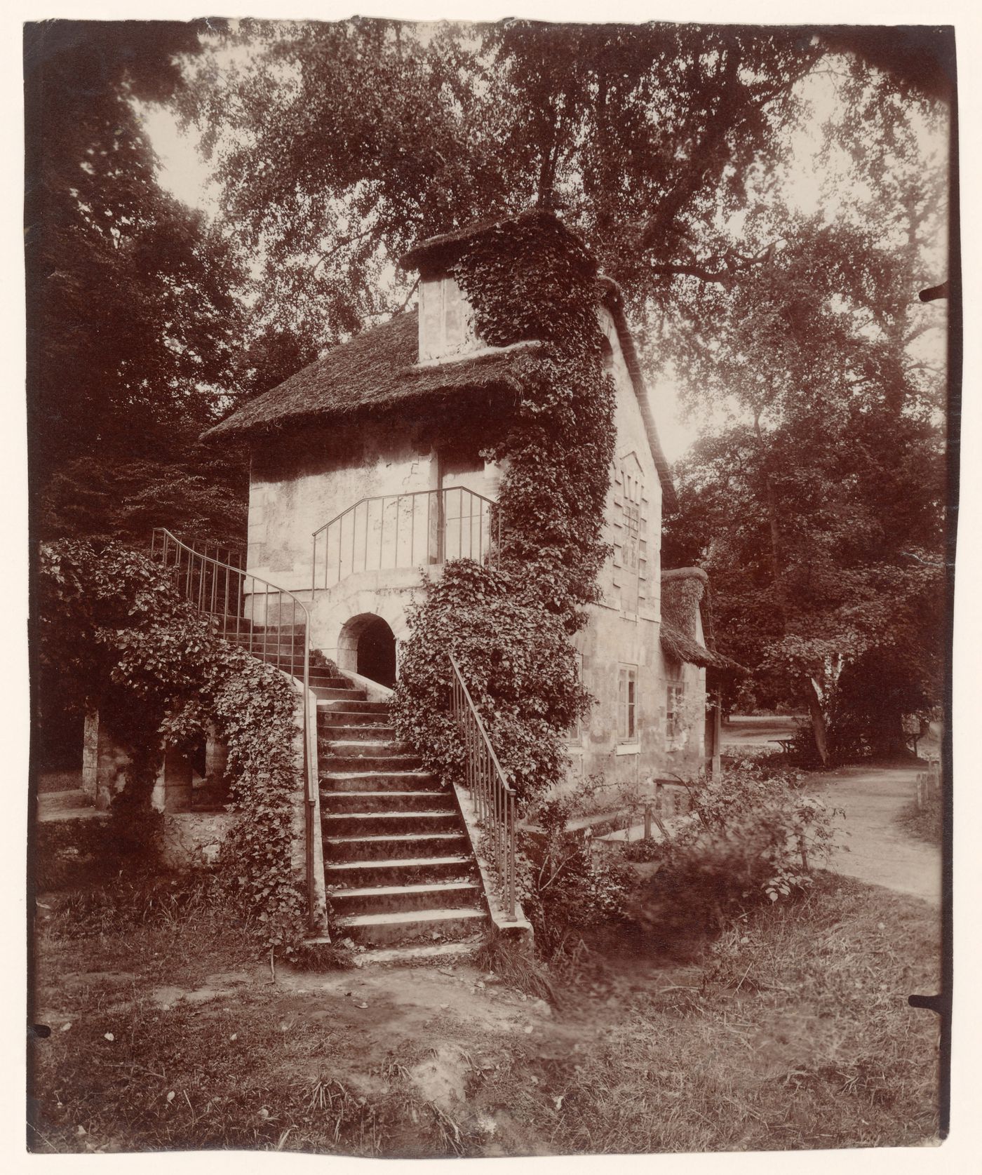 Le Hameau rustic cottage in farm village near grounds of Petit Trianon, Versailles, France