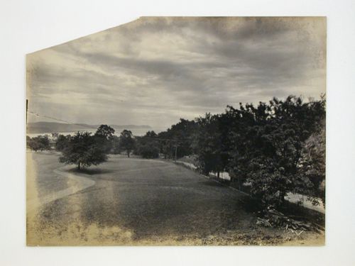 Partial view of the Longue Vue Golf Course showing a road on the right with a view of a river in the distance, New York [?], United States