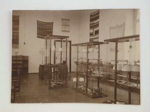 Interior view of the Bauhaus Exhibition of 1923 in Weimar showing wall hangings and display cases, Germany