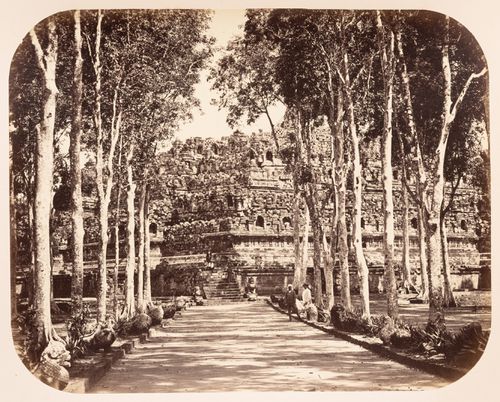 View of Borobudur and a tree-lined walkway, Dutch East Indies (now Indonesia)