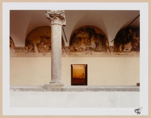 Interior view showing one Etruscan column, decorated alcoves and view into a room with sculpture, Tuscany, Italy