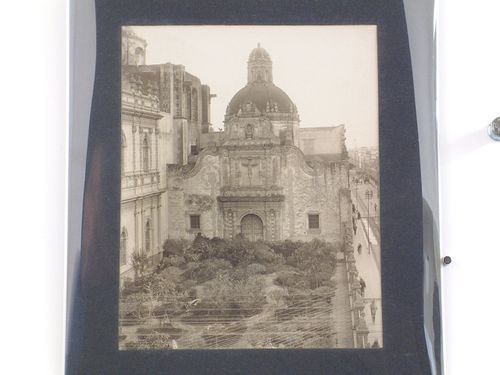 View of the principal façade and dome of the Capilla del Tercer Orden showing a garden and on the left, a side façade of the Iglesia de San Agustín (now the Biblioteca Nacional de México), Mexico City, Mexico