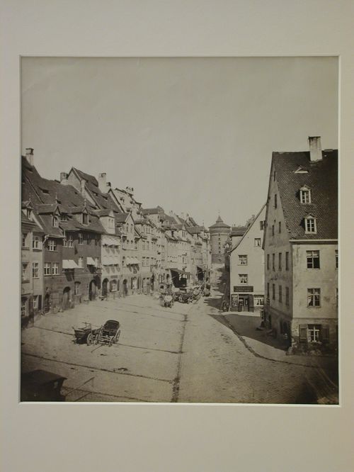 View of an unidentified street toward a round tower, Nuremberg, Germany