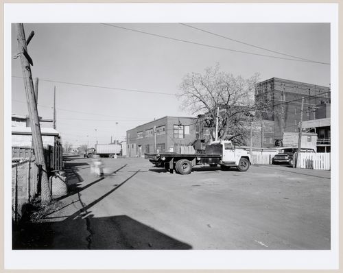View of the lane behind St. Ambroise Street with the Standard Chemical Company Building in the background, Montréal, Québec