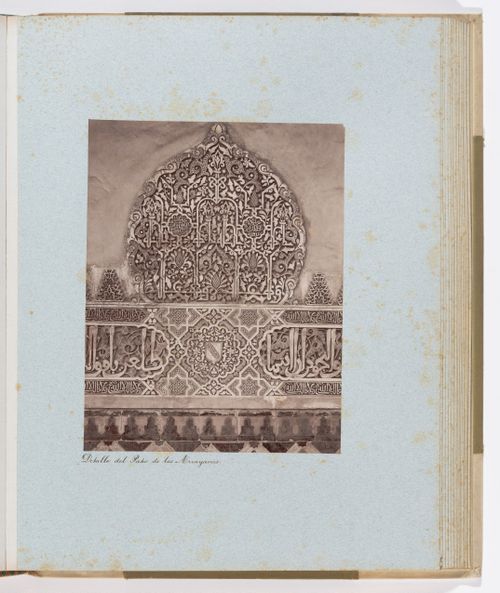 Close-up view of arabesques and calligraphy in Court of the Mrytles, Alhambra, Granada, Spain
