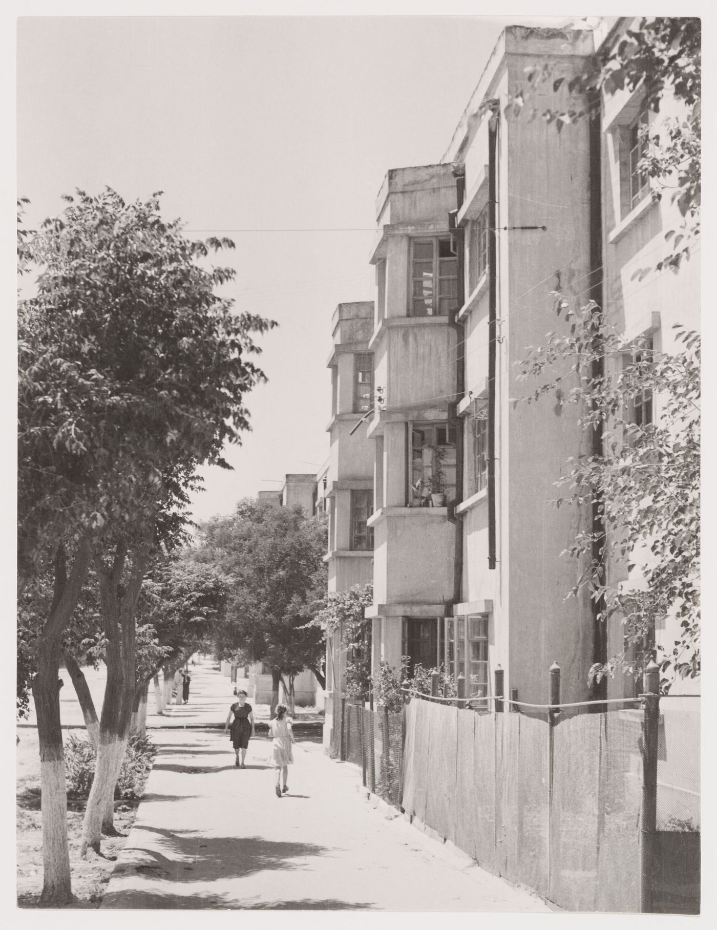 View of a street with housing in the foreground, Armenikend (Shaumian) settlement, Baku, Soviet Union (now in Azerbaijan)