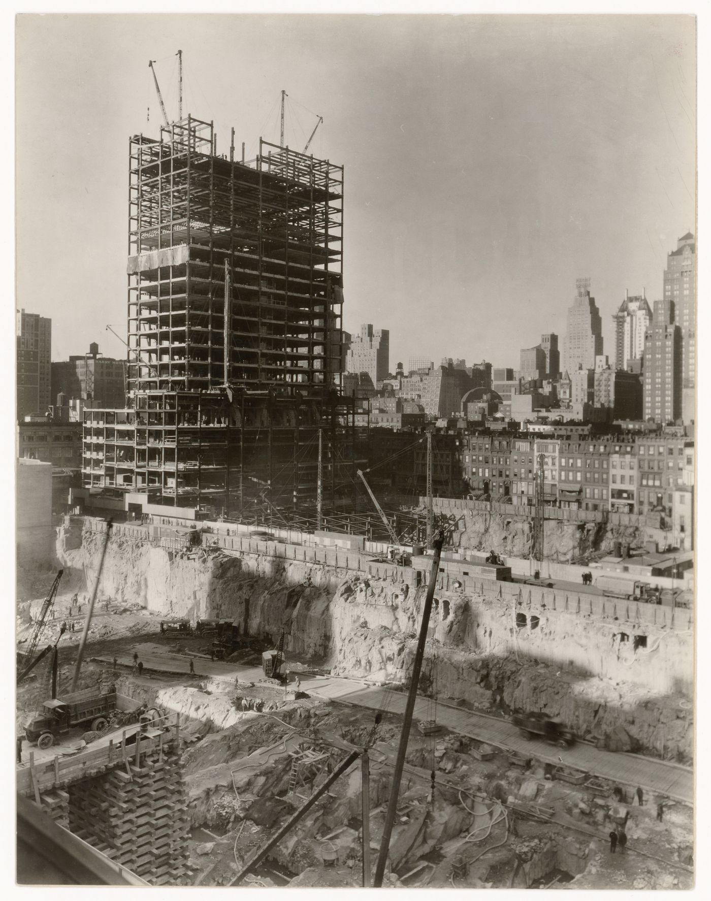 View of construction work in progress at the Rockefeller Center, with excavation in foreground, New York, New York, United States