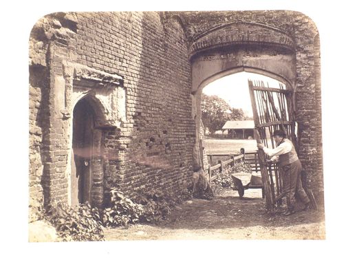 View of man shutting a wickergate