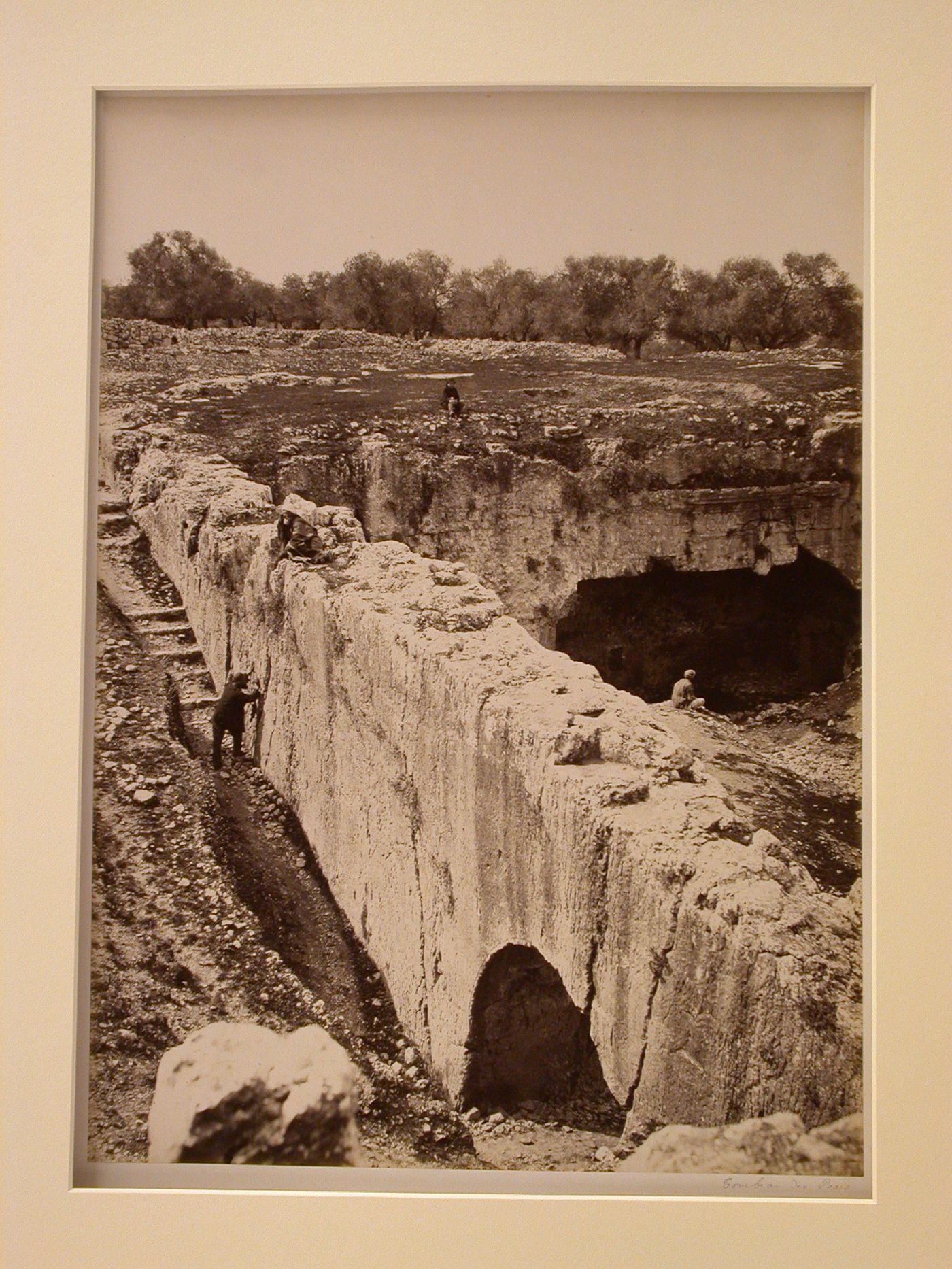 North of northern city wall, Tomb of Queen Helena of Adiabene, view top with figures looking down into complex, Jerusalem, Palestine