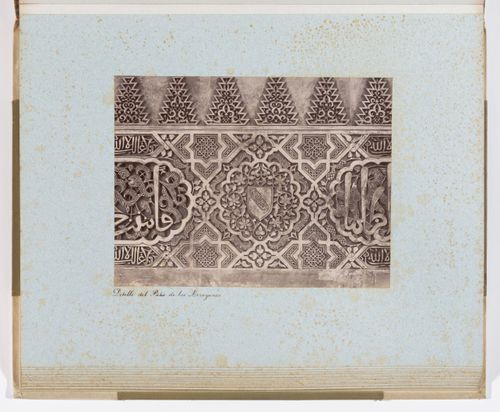 Close-up view of arabesques and calligraphy in Court of the Mrytles, Alhambra, Granada, Spain
