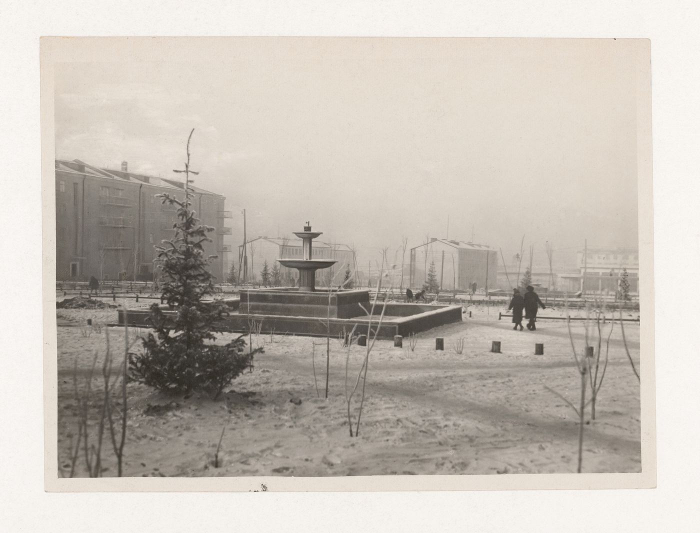 View of a square in the First Block showing a fountain and housing, Magnitogorsk, Soviet Union (now in Russia)