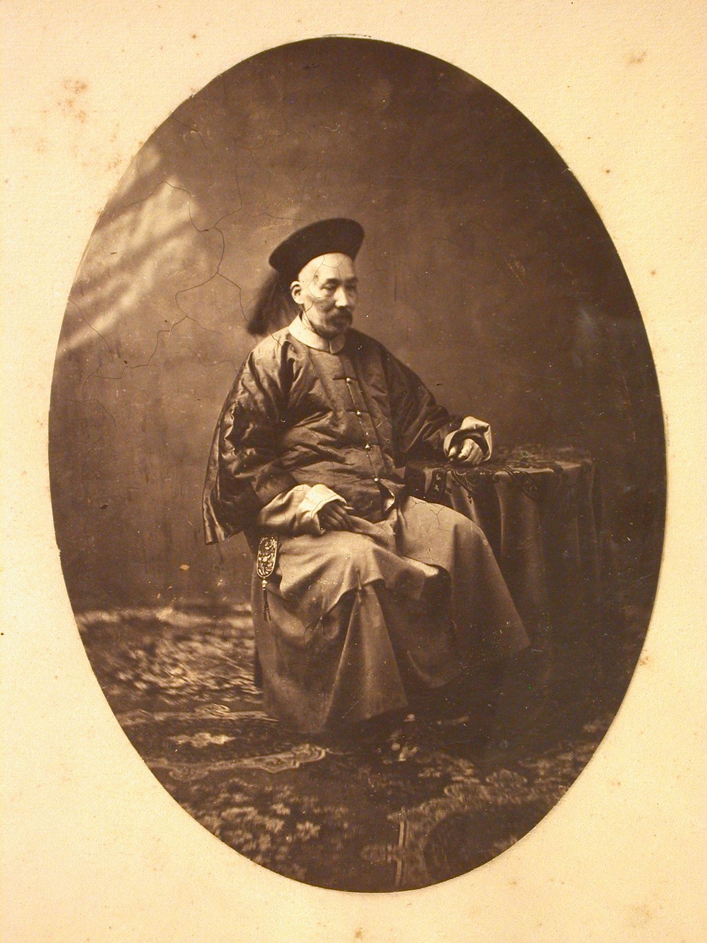 Portrait of Wu Xiaofan, the Taotai (now Daotai) [Intendant] of Shanghai, seated at a table, Shanghai, China