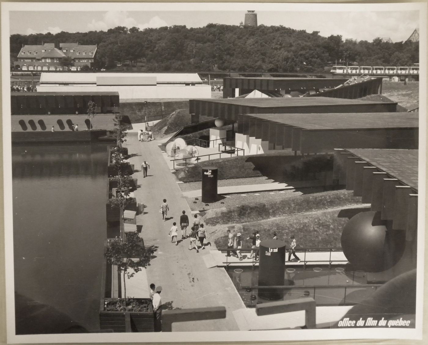 Partial view of the Man the Provider Pavilion with the Hélène de Champlain and the Lévis Tower in background, Expo 67, Montréal, Québec