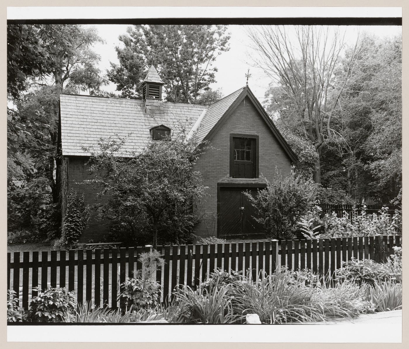 View of the principal façade of a garage with living quarters above (formerly a stable), 46 Aberdeen Avenue, Westmount, Québec