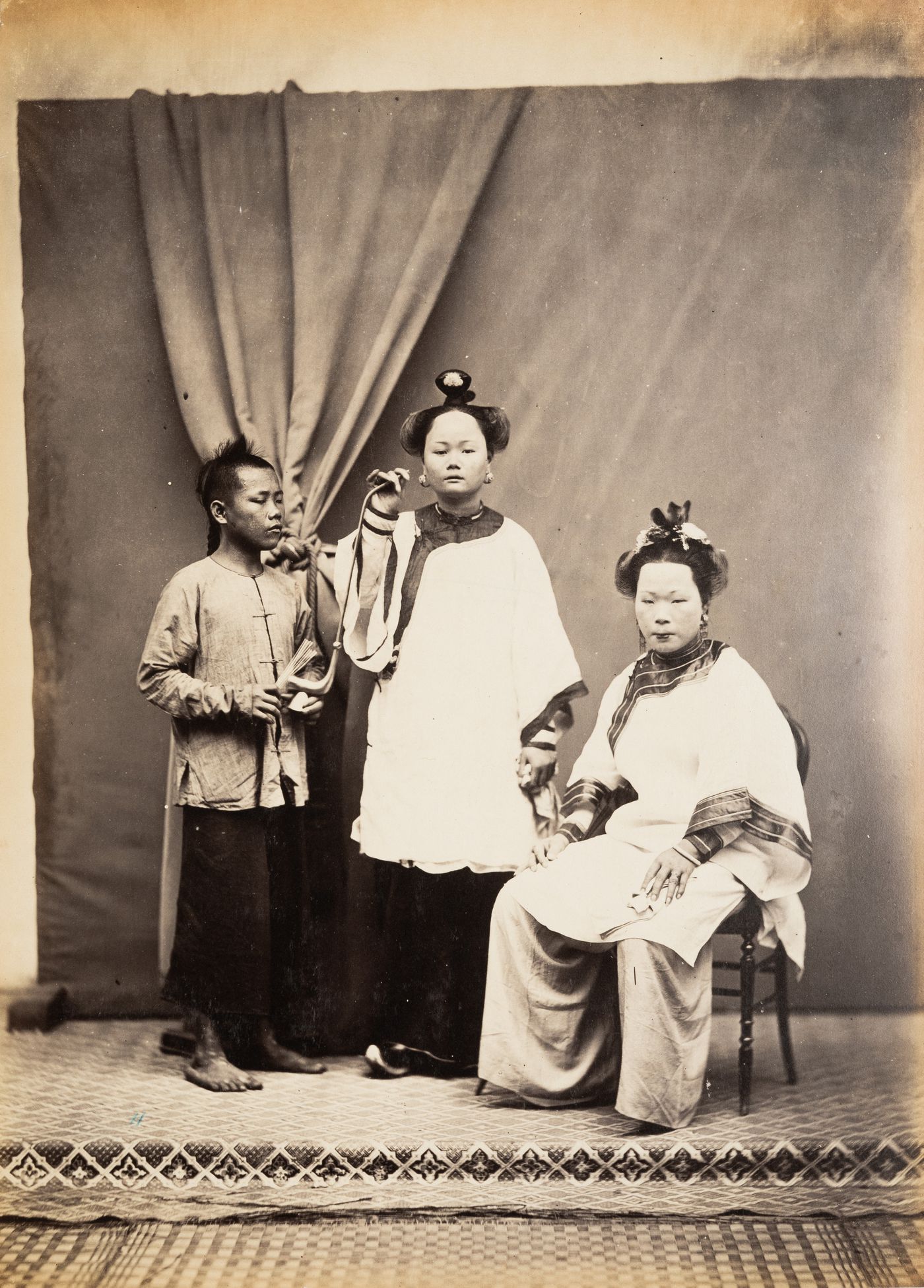 Group portrait of three women, Singapore