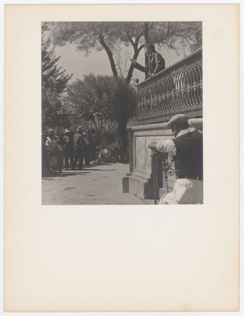 View of an agrarian meeting showing Diego Rivera speaking from a balcony, Mexico