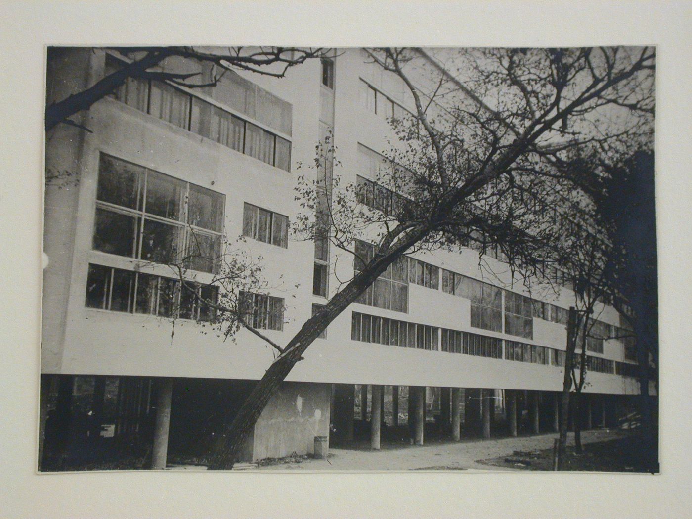 Partial view of the façade of the People's Commissariat for Finance (Narkomfin) Apartment Building from the river, 25 Novinskii Boulevard, Moscow