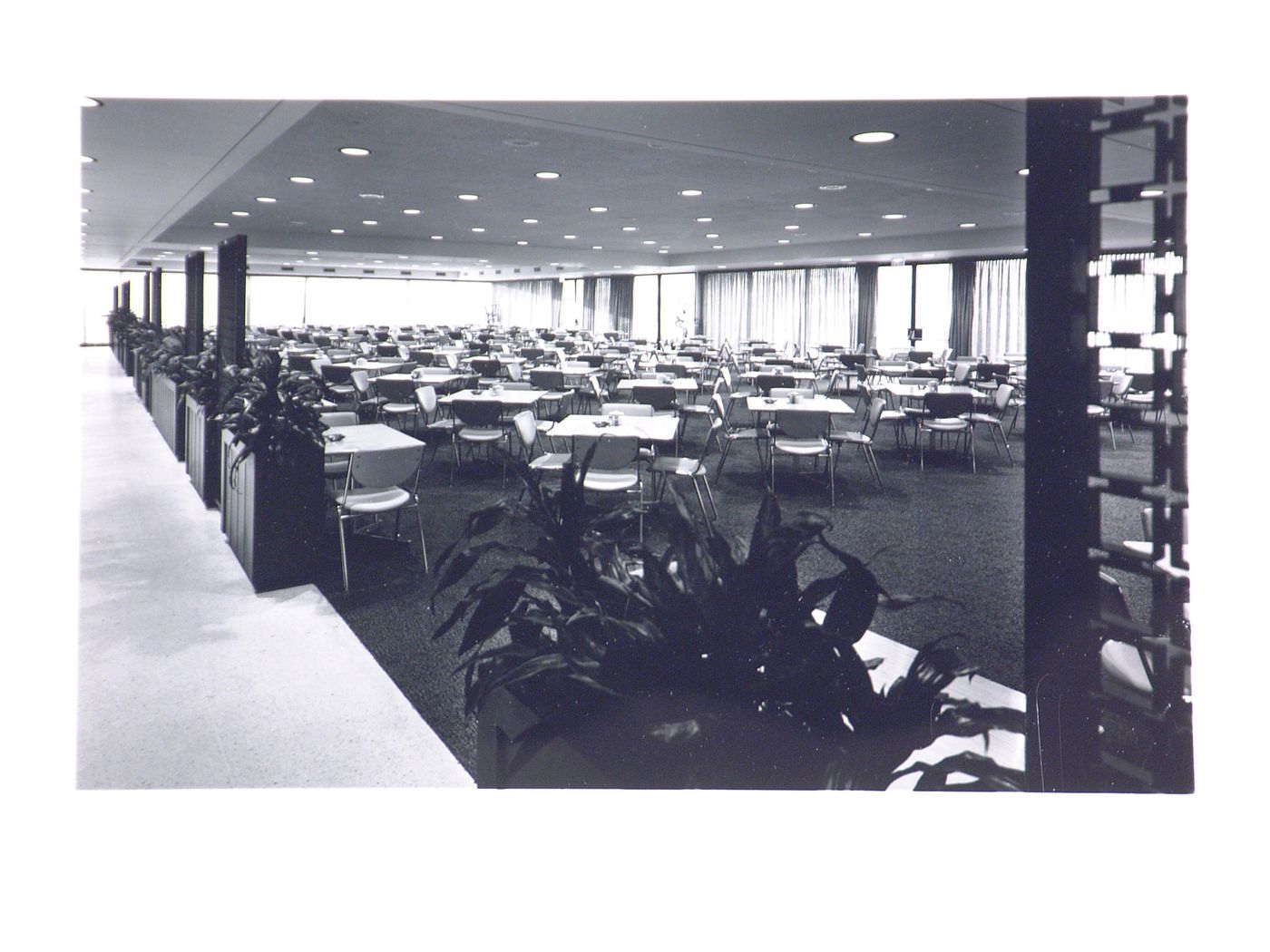 Interior view of the cafeteria area with tables and chairs, Gulf Life Tower building, Jacksonville, Florida, United States