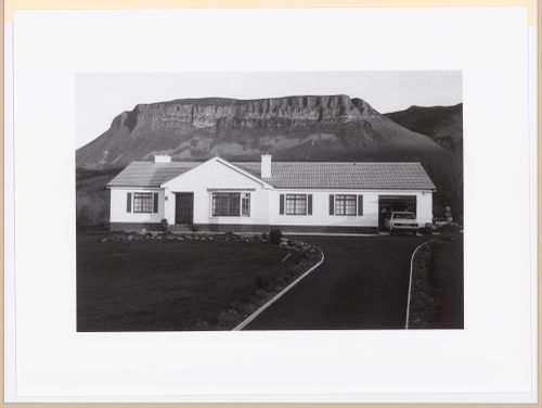 Bungalow in front of rock formation, Glencar, County Sligo, Ireland