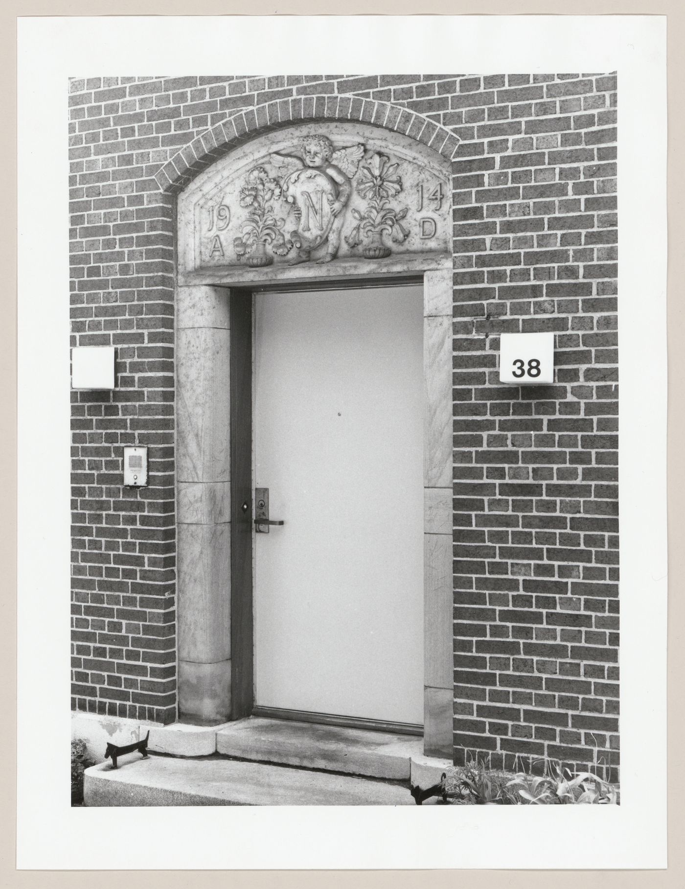 View of an entrance to a house showing a carved marble [?] surround, 38 Sunnyside Avenue, Westmount, Québec