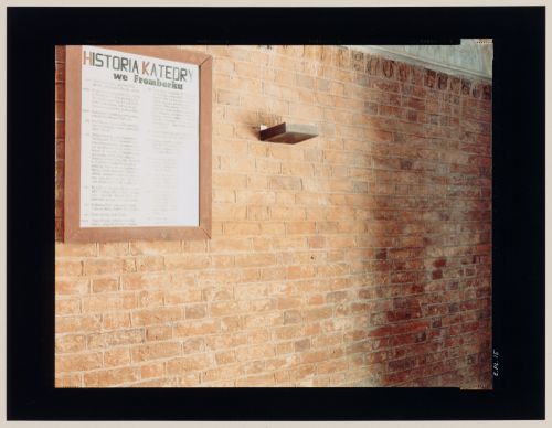 View of a chalk sign on a brick wall, Frombork, Poland