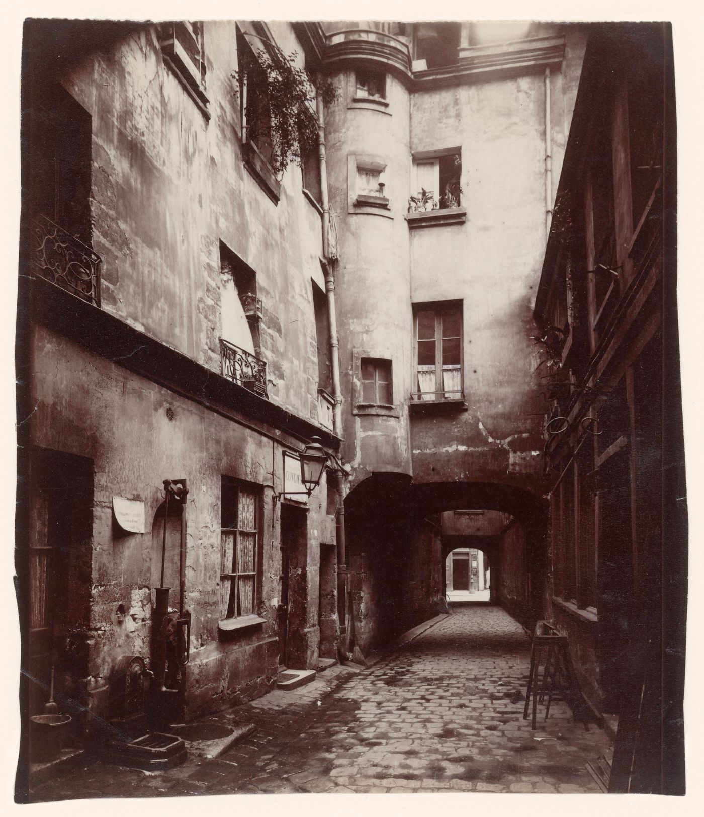56 Rue de la Verriere, building with arched section over street, Paris, France