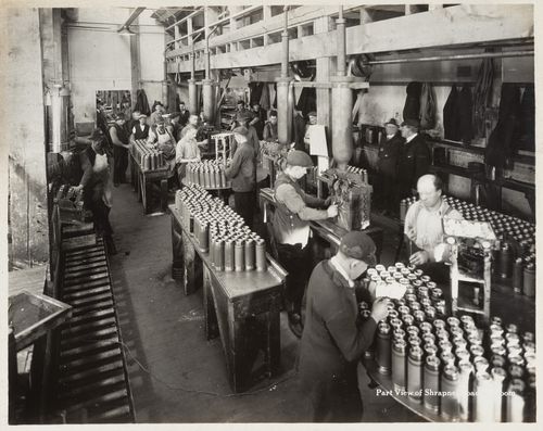 Interior view of workers in shrapnel loading room at the Energite Explosives Plant No. 3, the Shell Loading Plant, Renfrew, Ontario, Canada