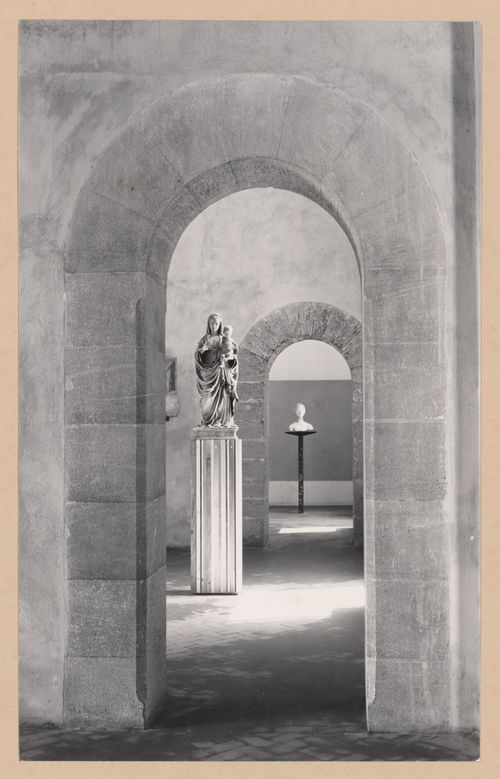 View of a doorway,  the Sala dei Gagini and the Sala di F. Laurana showing sculpture, from the Sala della scultura, Palazzo Abatellis, Galleria regionale della Sicilia, Palermo, Italy