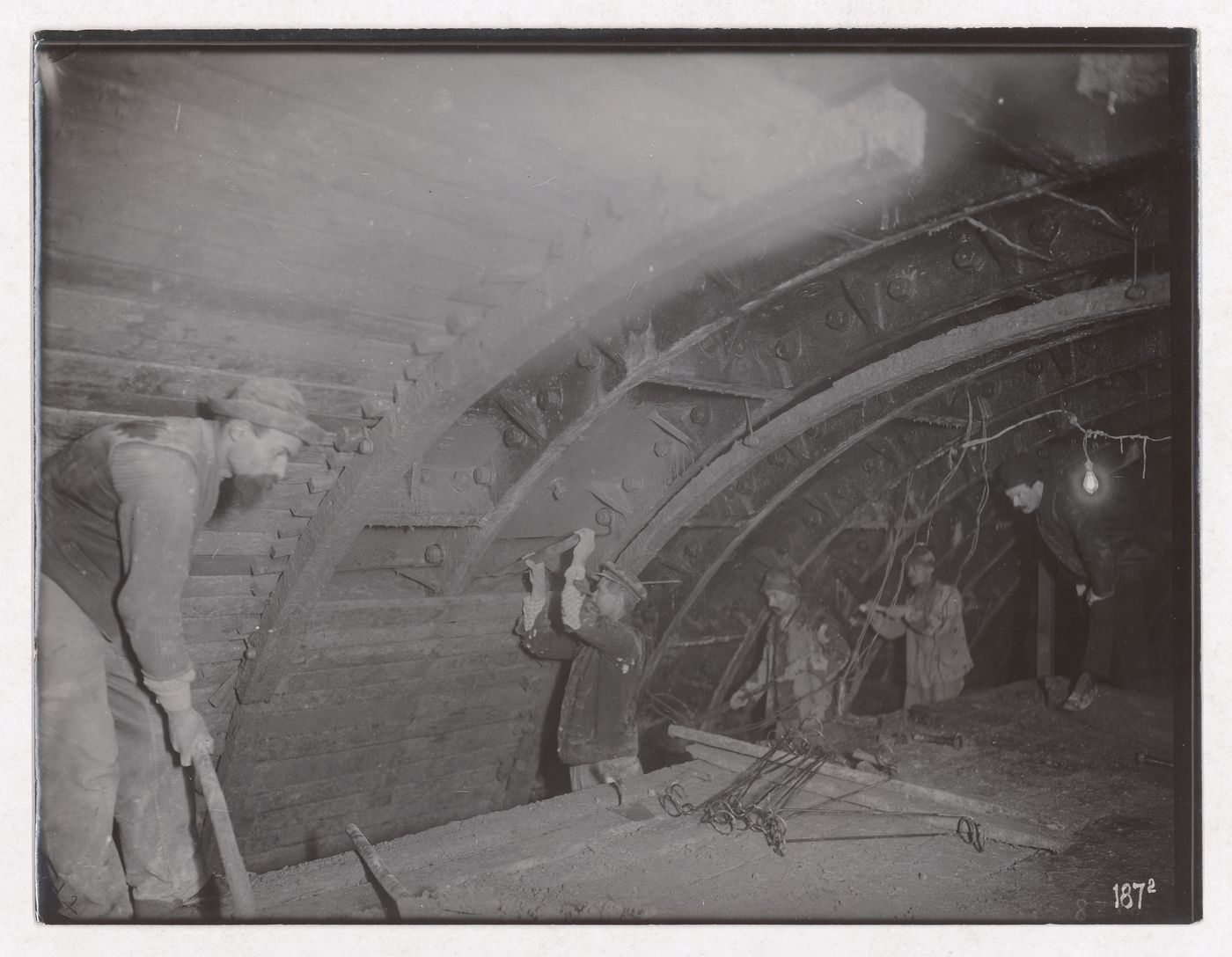Construction of the Paris Metro, interior view of tunnel with workers, Paris, France