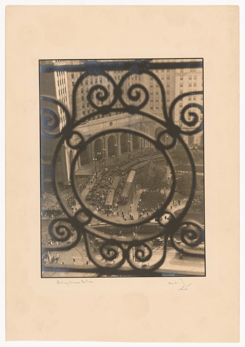 Public Square (the Terminal Tower) at 5:00, seen through a Wiliamson Building grille, Cleveland, Ohio, United States