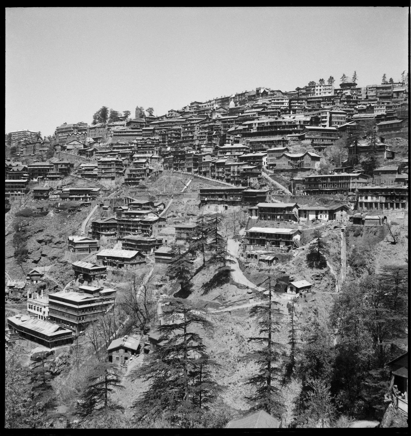 View of buildings on the mountainside, India